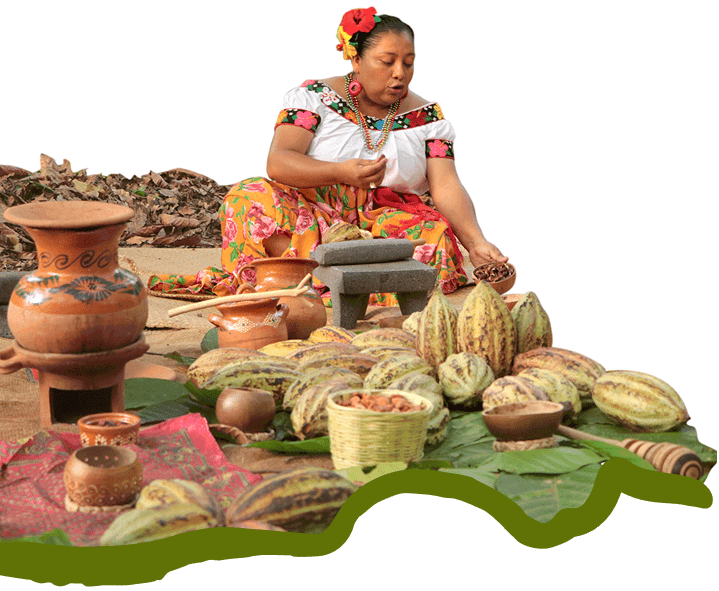 Mujer indígena procesa granos de cacao usando herramientas de cerámica.